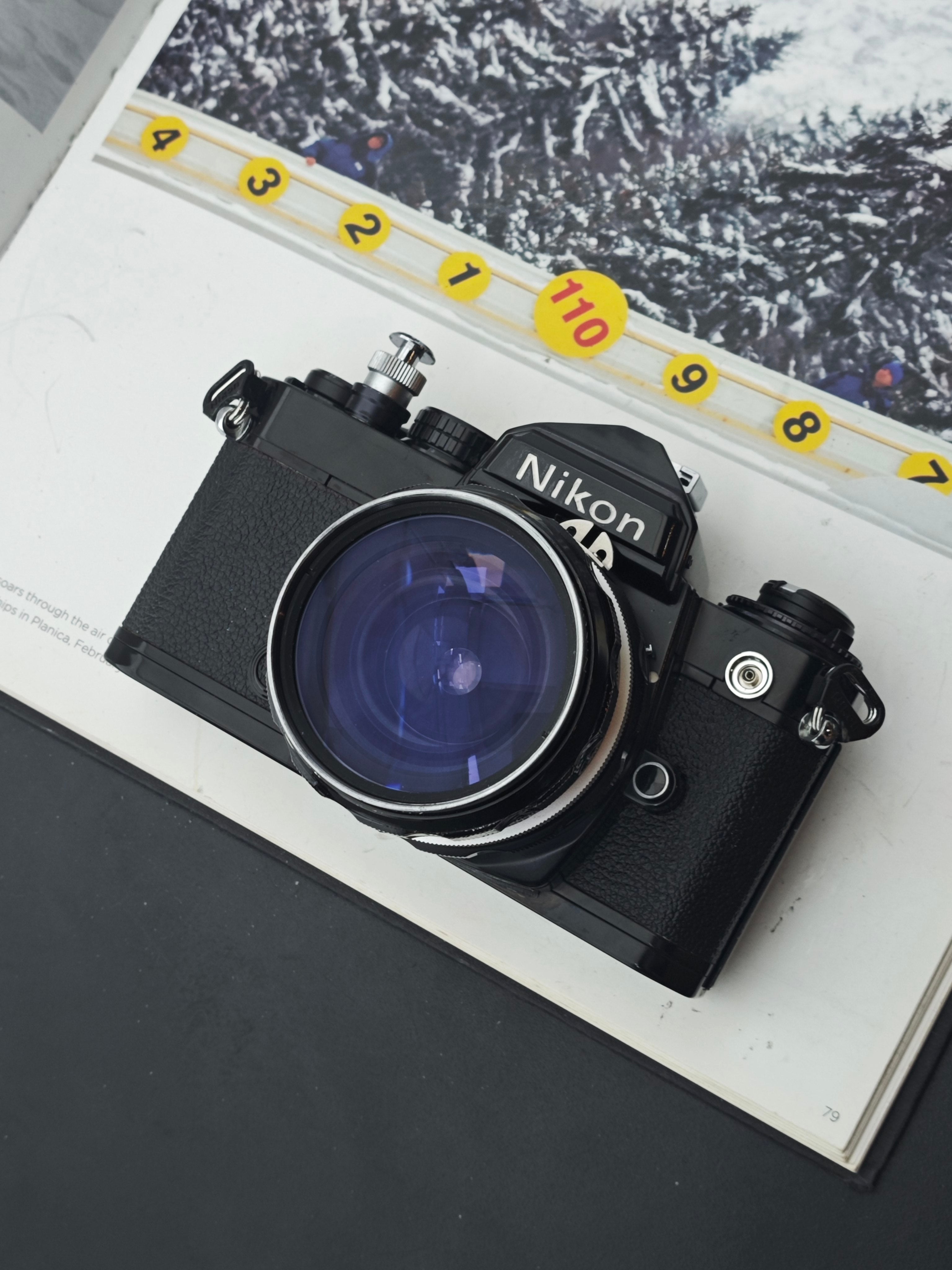 Nikon FE black with Nikon Nikkor-H Auto 28mm F3.5 – UNIT CAMERA