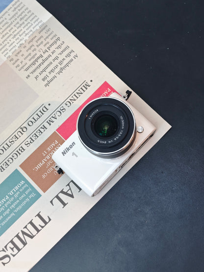 Used Nikon 1 S2 White with 1 NIKKOR VR 10-30mm F3.5-5.6 [No charger]