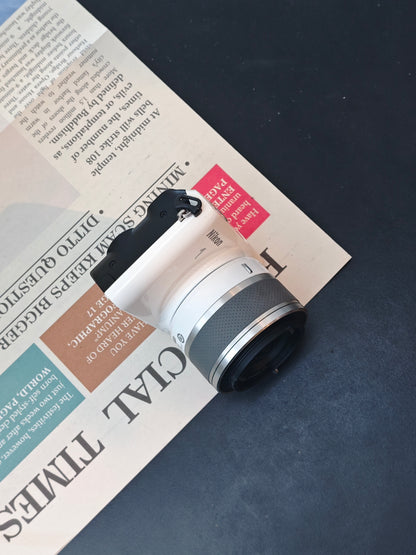 Used Nikon 1 S2 White with 1 NIKKOR VR 10-30mm F3.5-5.6 [No charger]