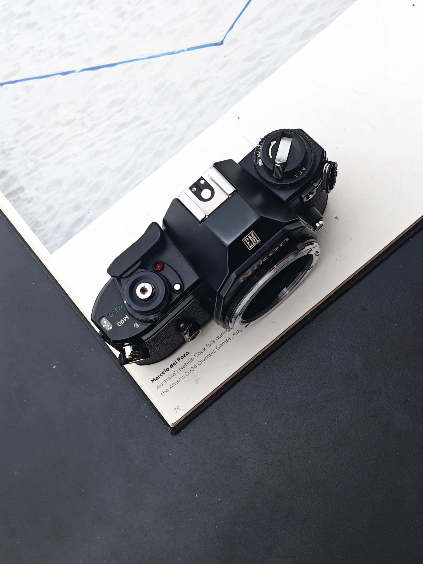 Nikon EM body #7639123