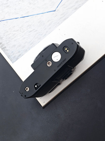 Nikon EM body #7639123