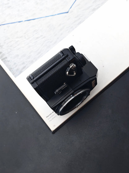 Nikon EM body #7639123