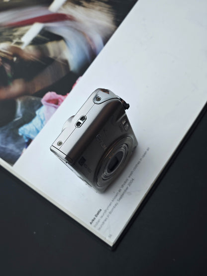 Used Casio EXILIM EX-Z1200 Digital Camera [No charger]