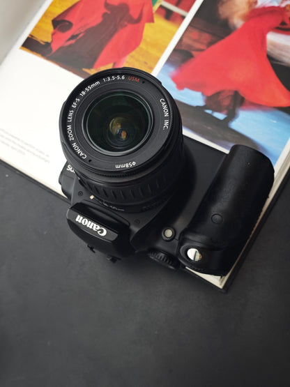 Used Canon EOS Kiss Digital with Canon zoom lens EF-S 18-55mm F3.5-5.6 USM