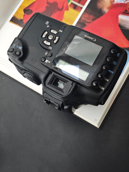 Used Canon EOS Kiss Digital with Canon zoom lens EF-S 18-55mm F3.5-5.6 USM