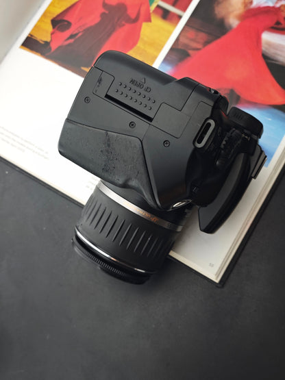 Used Canon EOS Kiss Digital with Canon zoom lens EF-S 18-55mm F3.5-5.6 USM