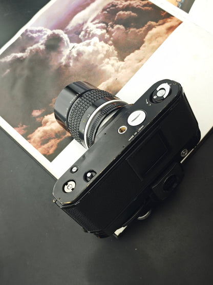 Nikon F2 black with Nikon Nikkor 135mm  F2.8 Ai-S