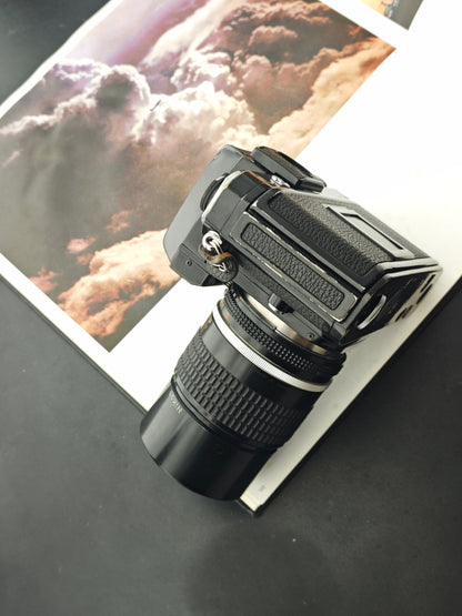 Nikon F2 black with Nikon Nikkor 135mm  F2.8 Ai-S