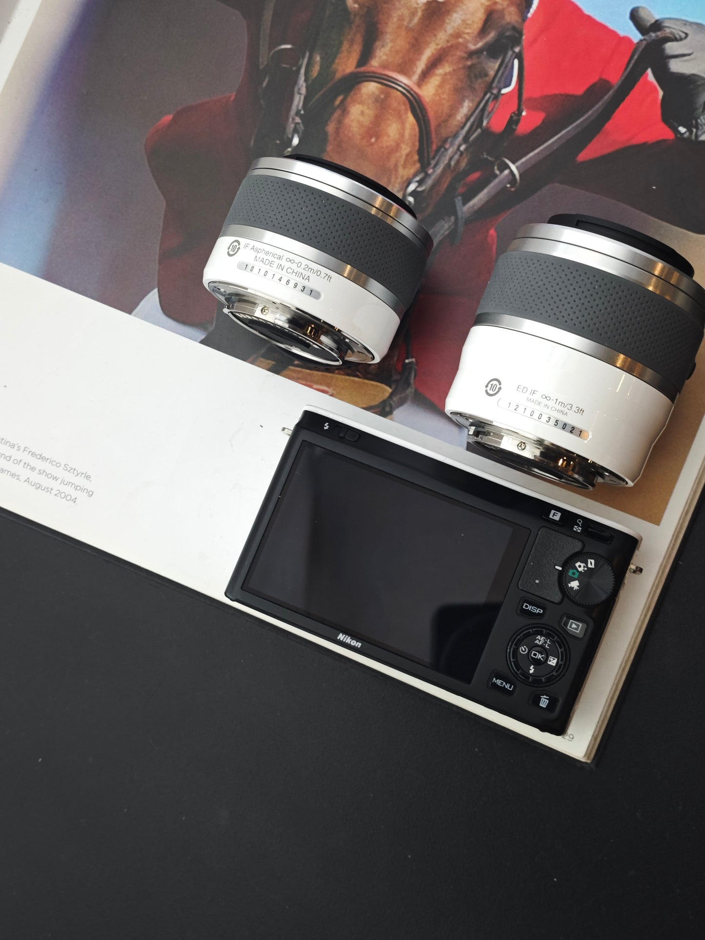 Used Nikon 1 J1 white with 10-30mm F3.5-5.6, 30-110mm F3.8-5.6