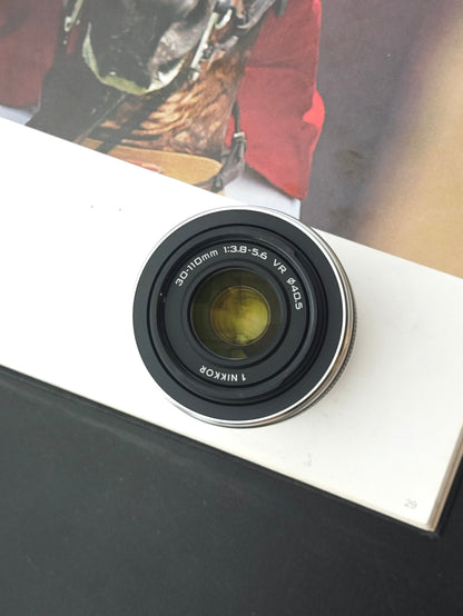 Used Nikon 1 J1 white with 10-30mm F3.5-5.6, 30-110mm F3.8-5.6