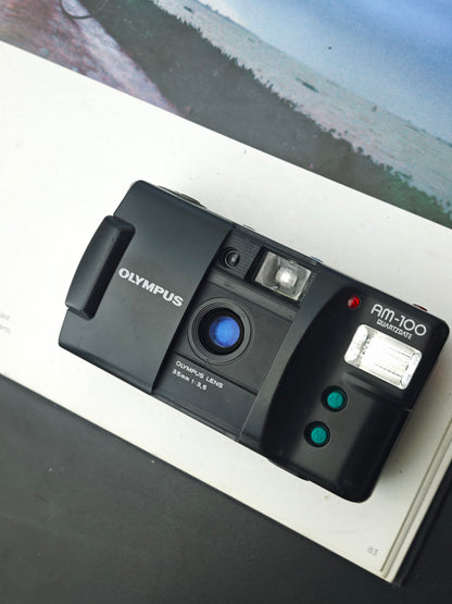 Olympus AM-100 Quartz Date #1086831