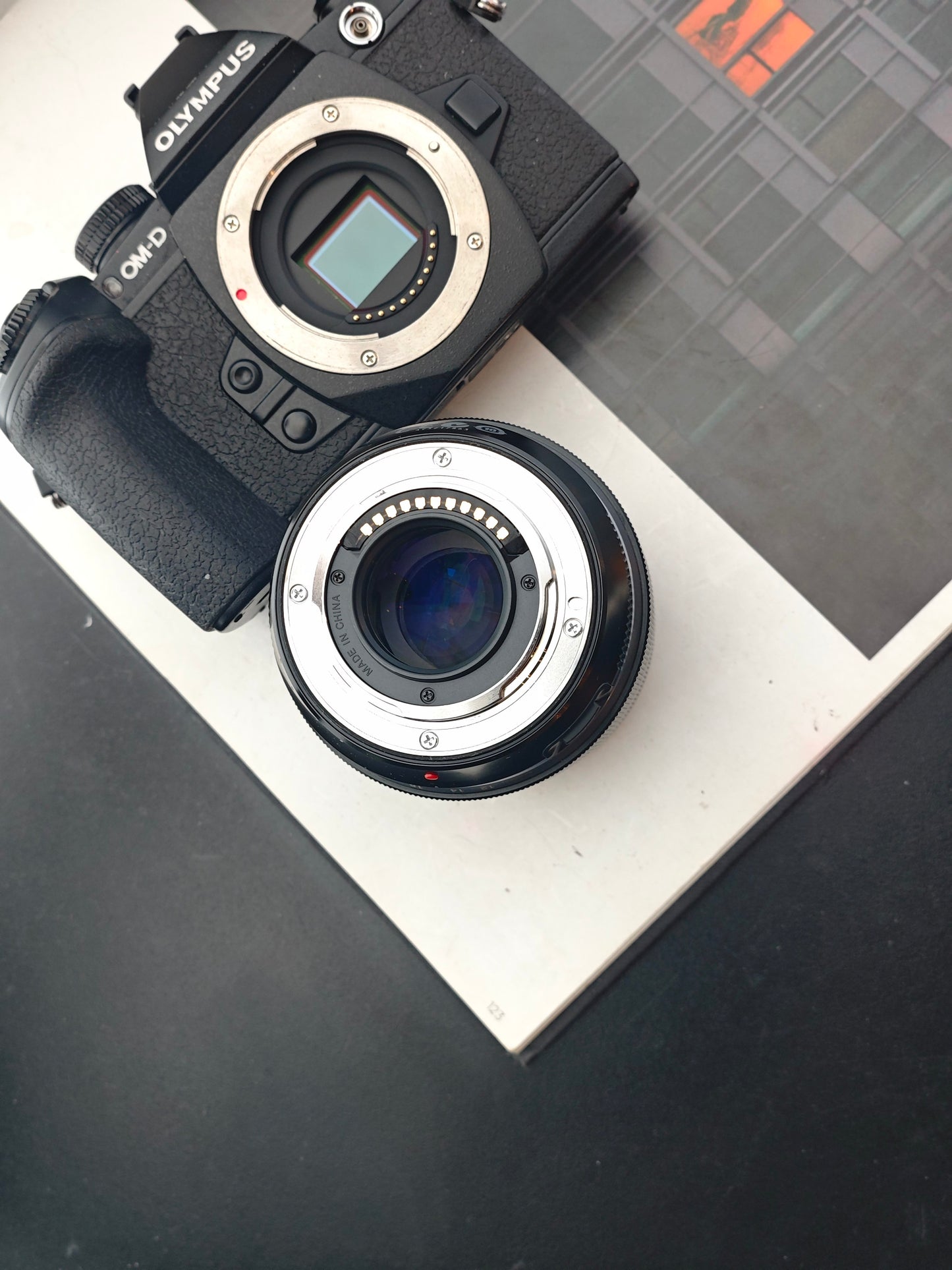 Olympus OM-D E-M1 with M.Zuiko Digital 12-40mm F2.8 [No charger]