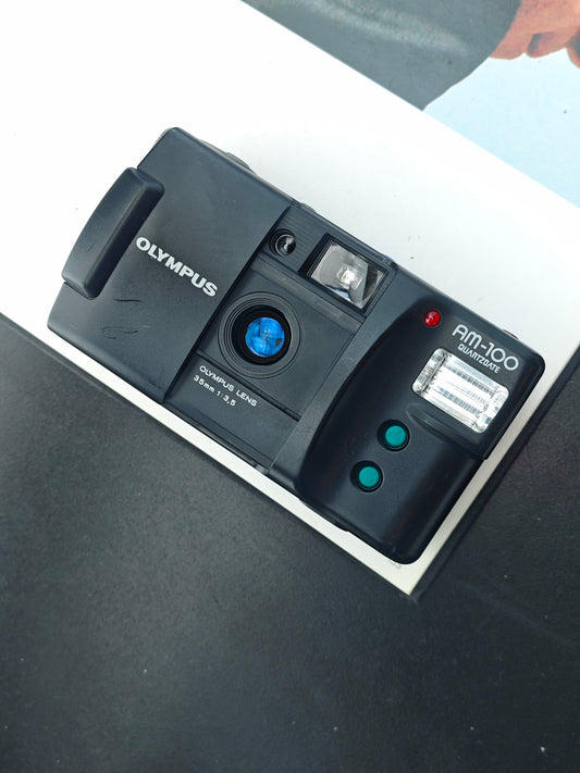 Olympus AM-100 Quartz Date #1125373