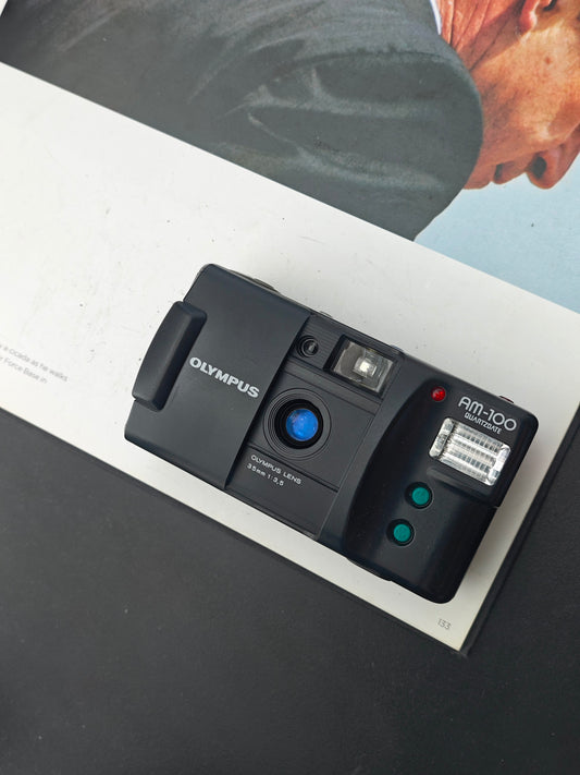 Olympus AM-100 Quartz Date #1180521