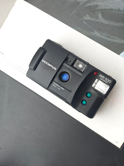 Olympus AM-100 Quartz Date #1129401