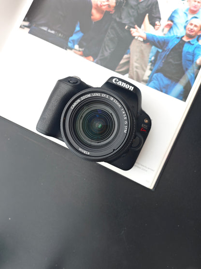 Used Canon EOS Kiss X9 with Double Zoom Kit Digital Camera [No charger]