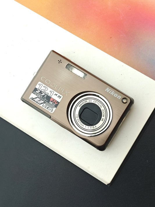 Used Nikon Coolpix S700 brown Digital Camera [No charger]