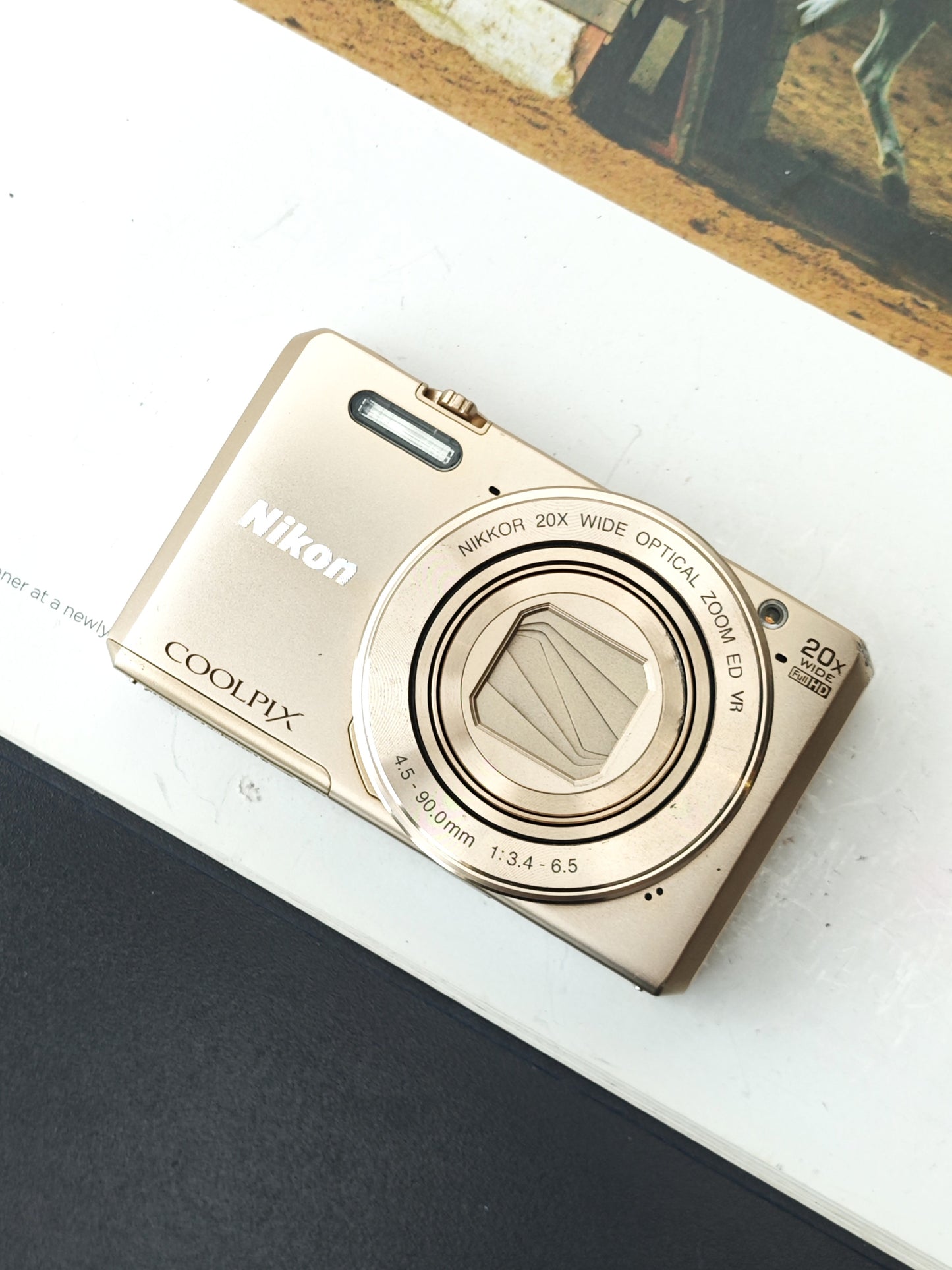 Used Nikon Coolpix S7000 gold Digital Camera [No charger]