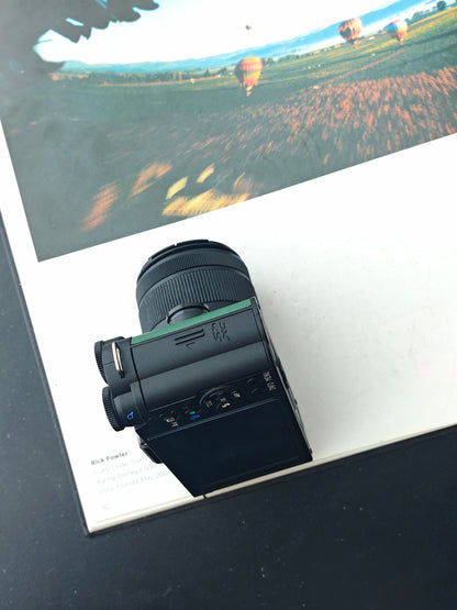 Used Pentax Q-S1 black&green with 02 Standard Zoom 5-15mm F2.8-4.5 and 06 Telephoto Zoom 15-45mm F2.8