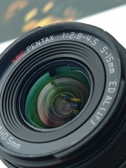 Used Pentax Q-S1 black&green with 02 Standard Zoom 5-15mm F2.8-4.5 and 06 Telephoto Zoom 15-45mm F2.8