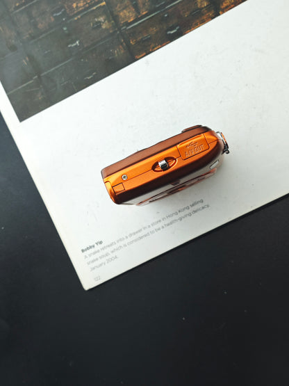 Used Nikon Coolpix S3500 orange Digital Camera [No charger]