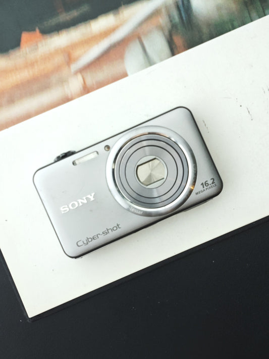 Used Sony Cyber-shot DSC-WX70 silver Digital Camera [JPN only, No charger]