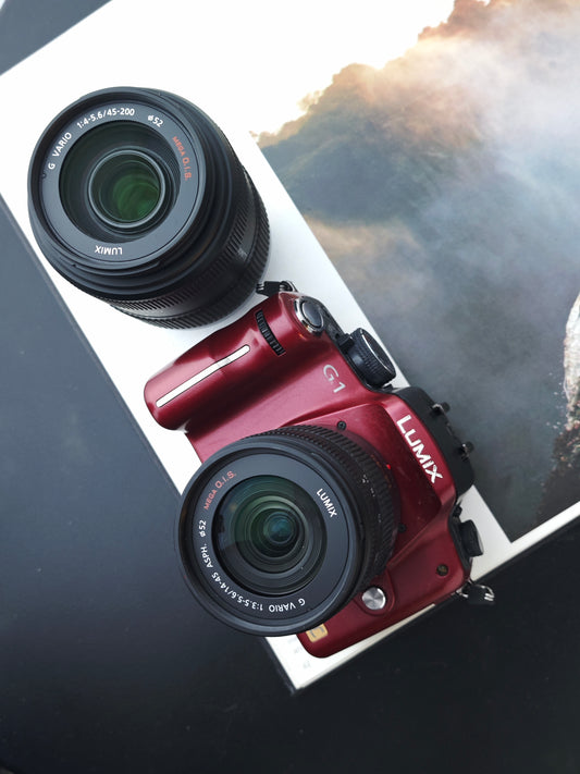 Used Panasonic Lumix G1 red with 14-45mm F3.5-5.6 and 45-200mmm F4-5.6 [JPN only, No charger]