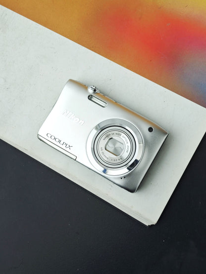Used Nikon Coolpix A100 silver Digital Camera [No charger]