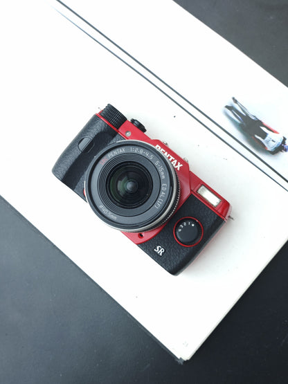 Used Pentax Q10 SR red with 02 Standard Zoom 5-15mm