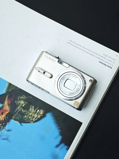 Used Panasonic Lumix DMC FX-07 gold Digital Camera [No charger]