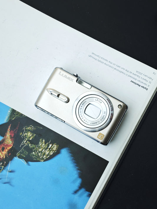 Used Panasonic Lumix DMC FX-07 gold Digital Camera [No charger]