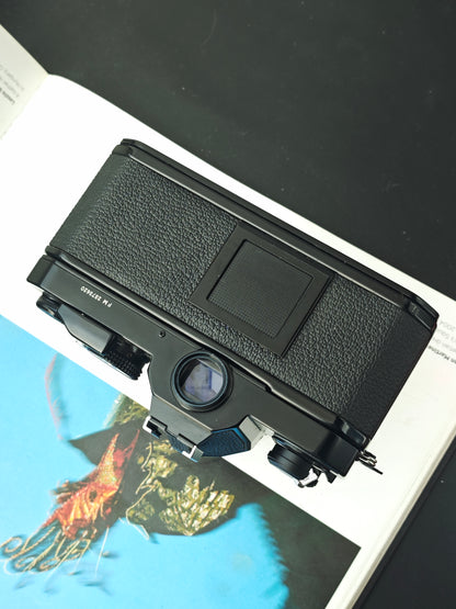 Nikon FM black with Nikkor 55mm F1.2 Ai