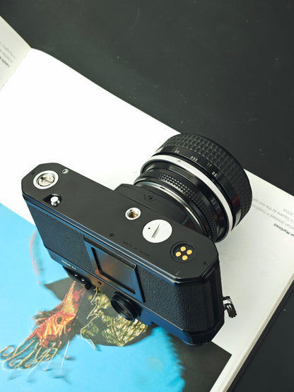 Nikon FM black with Nikkor 55mm F1.2 Ai