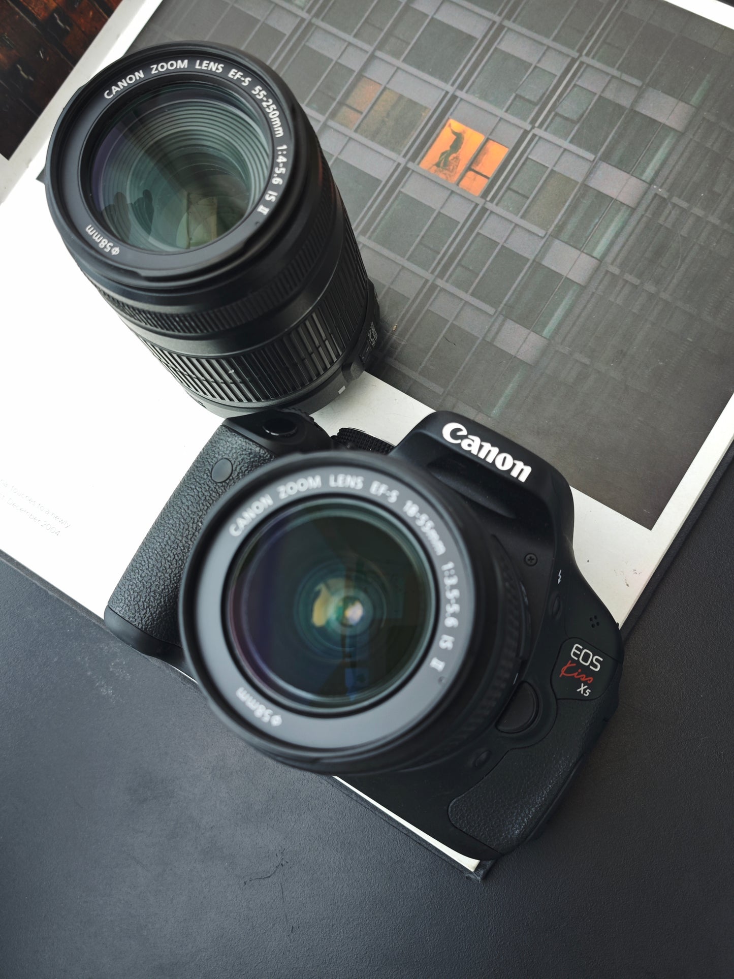 Used Canon EOS Kiss X5 with Double Zoom Kit Digital Camera [No charger]