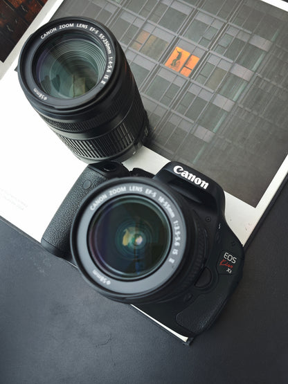 Used Canon EOS Kiss X5 with Double Zoom Kit Digital Camera [No charger]