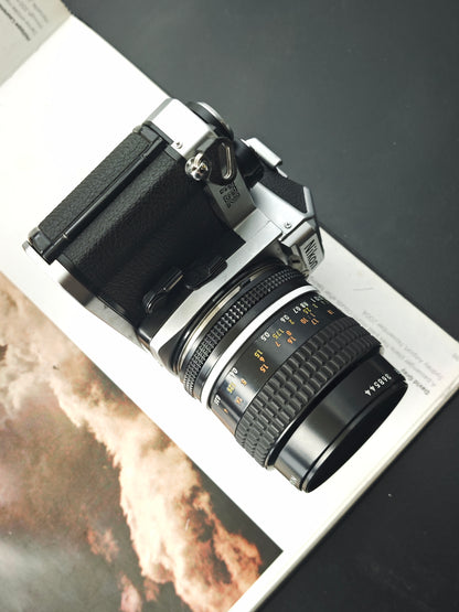 Nikon FE2 silver with Micro- Nikkor 55mm F2.8