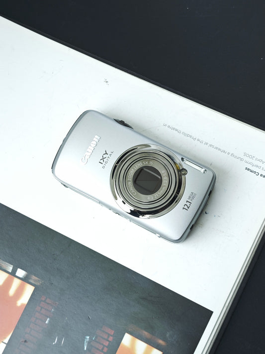 Used Canon IXY 930 IS silver Digital Camera [No charger]