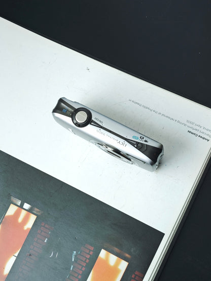 Used Canon IXY 930 IS silver Digital Camera [No charger]