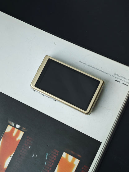 Used Panasonic Lumix DMC-FX77 gold Digital Camera [JPN only, No charger]