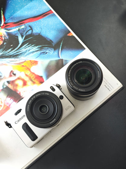 Used Canon EOS M white with EF-M 22mm F2 STM and EF-M 18-55mm F3.5-5.6 IS STM