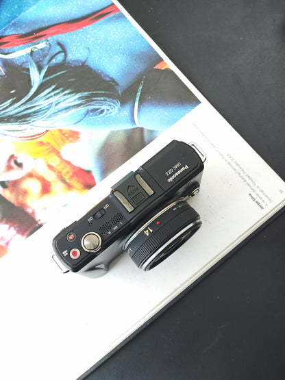 Used Panasonic Lumix DMC-GF2 black with Lumix G 14mm F2.5 [JPN only, No charger]