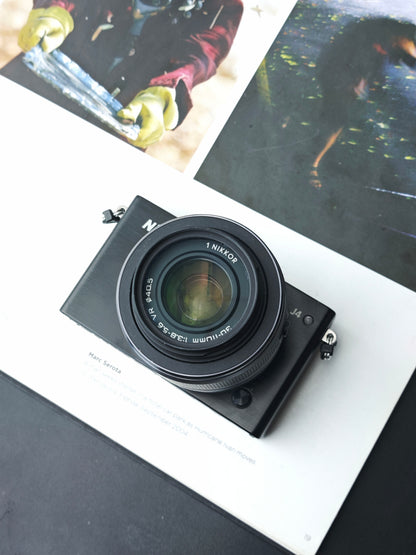 Used Nikon 1 J4 with 1 Nikkor 30-110mm F3.8-5.6 VR Digital Camera [No charger]