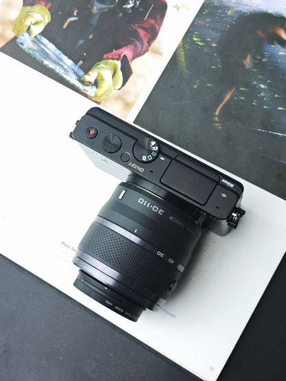 Used Nikon 1 J4 with 1 Nikkor 30-110mm F3.8-5.6 VR Digital Camera [No charger]