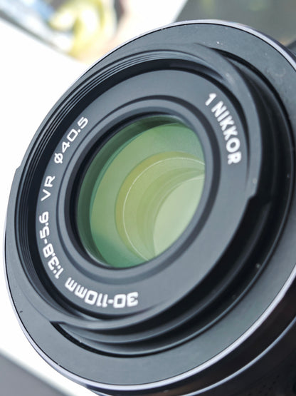 Used Nikon 1 J4 with 1 Nikkor 30-110mm F3.8-5.6 VR Digital Camera [No charger]