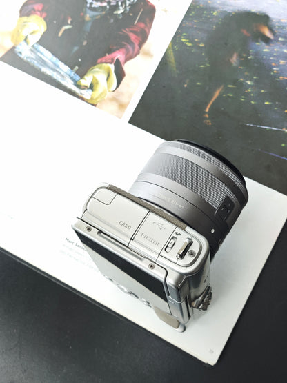 Used Canon EOS M100 with Double Zoom Kit Digital Camera [No charger]