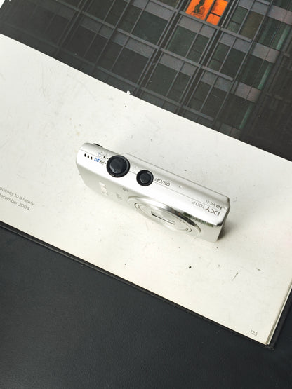 Used Canon IXY 100F silver Digital Camera [No charger]