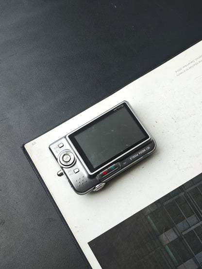 Used Casio EXILIM EX-Z1080 silver Digital Camera [No charger]