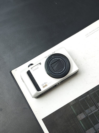 Used Casio EXILIM EX-ZR100 Digital Camera [No charger]