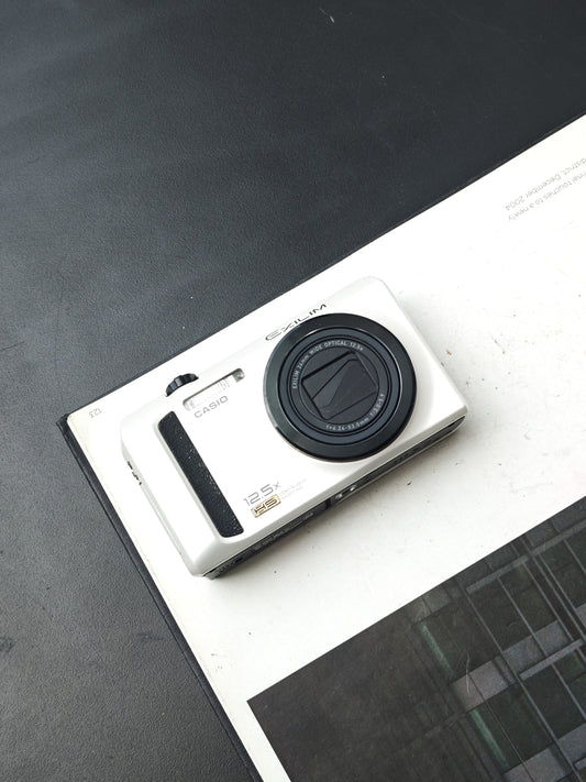 Used Casio EXILIM EX-ZR100 Digital Camera [No charger]