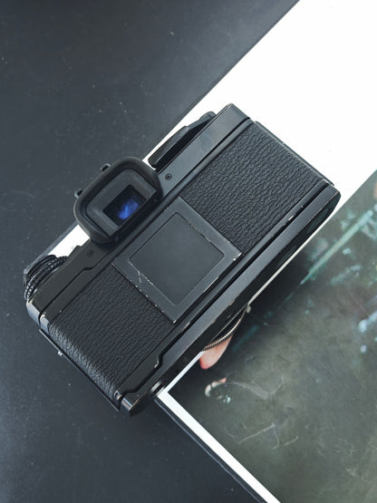 Olympus OM-4 Ti black with Voigtlander Color-Heliar 75mm F2.5 SL